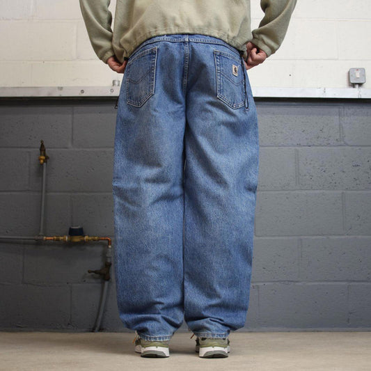 Vintage Carhartt jeans blue 90s skater style W38L30 relaxed denim 5 pocket pants