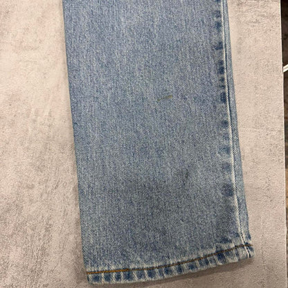 Blue Levi's 550 jeans size 12 (W30L33) relaxed fit taper leg denim jeans