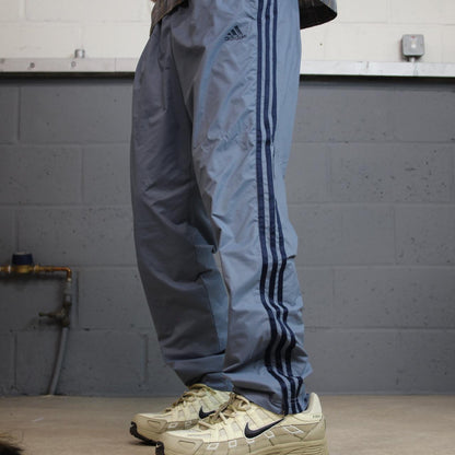 Y2K Adidas tracksuit bottoms grey blue medium side stripe design 2000s style track pants