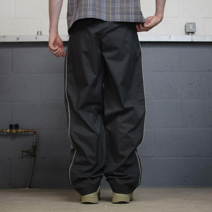 Vintage Nike baggy tracksuit bottoms Y2K grey Wide leg lined embroidered side stripe track pants