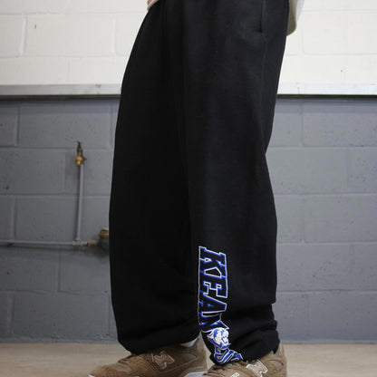 Baggy Champion tracksuit bottoms joggers M y2k black track pants embroidered casual gym wear sporty