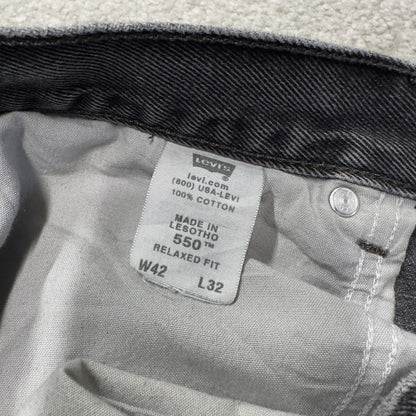 Levi’s 550 jeans Y2K relaxed fit denim faded black Levi’s loose leg 2000s style pants red tab logo