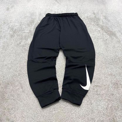 00s Nike tracksuit bottoms y2k M loose black joggers print Swoosh logo gym wear trackies