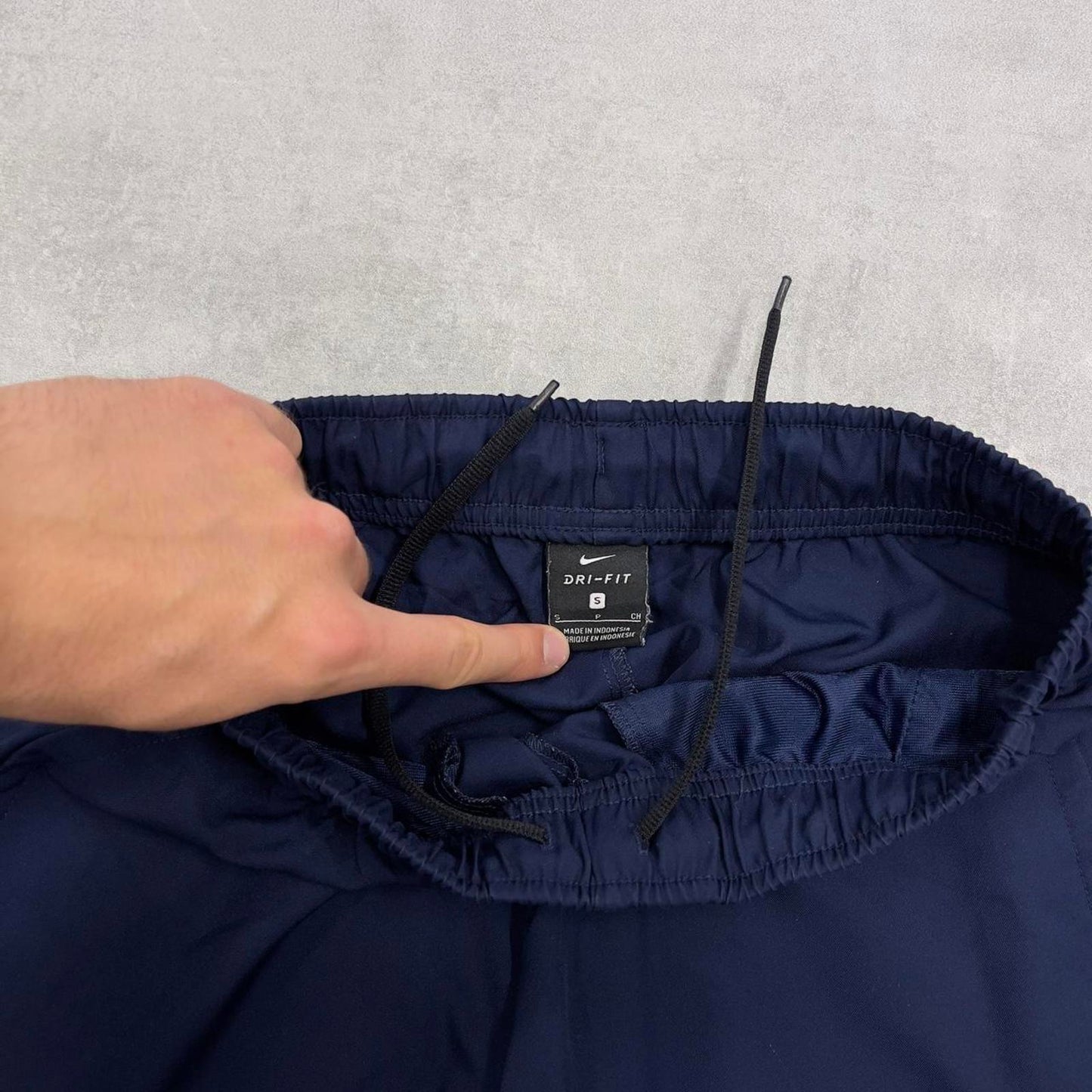 Nike Trackies S navy y2k 00s style dri-fit joggers embroidered logo zip ankles