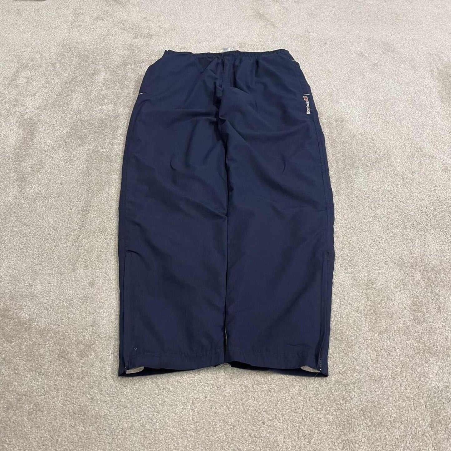 Vintage Reebok tracksuit bottoms loose navy Floaty embroidered mesh lined track pants
