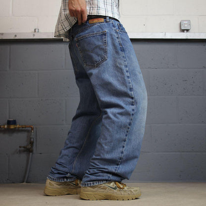 Levi’s 550 jeans Y2K W38L32 blue denim loose leg red tab logo