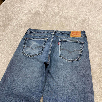 Vintage y2k Levi's 505 jeans blue Straight leg denim casual pants red tab logo