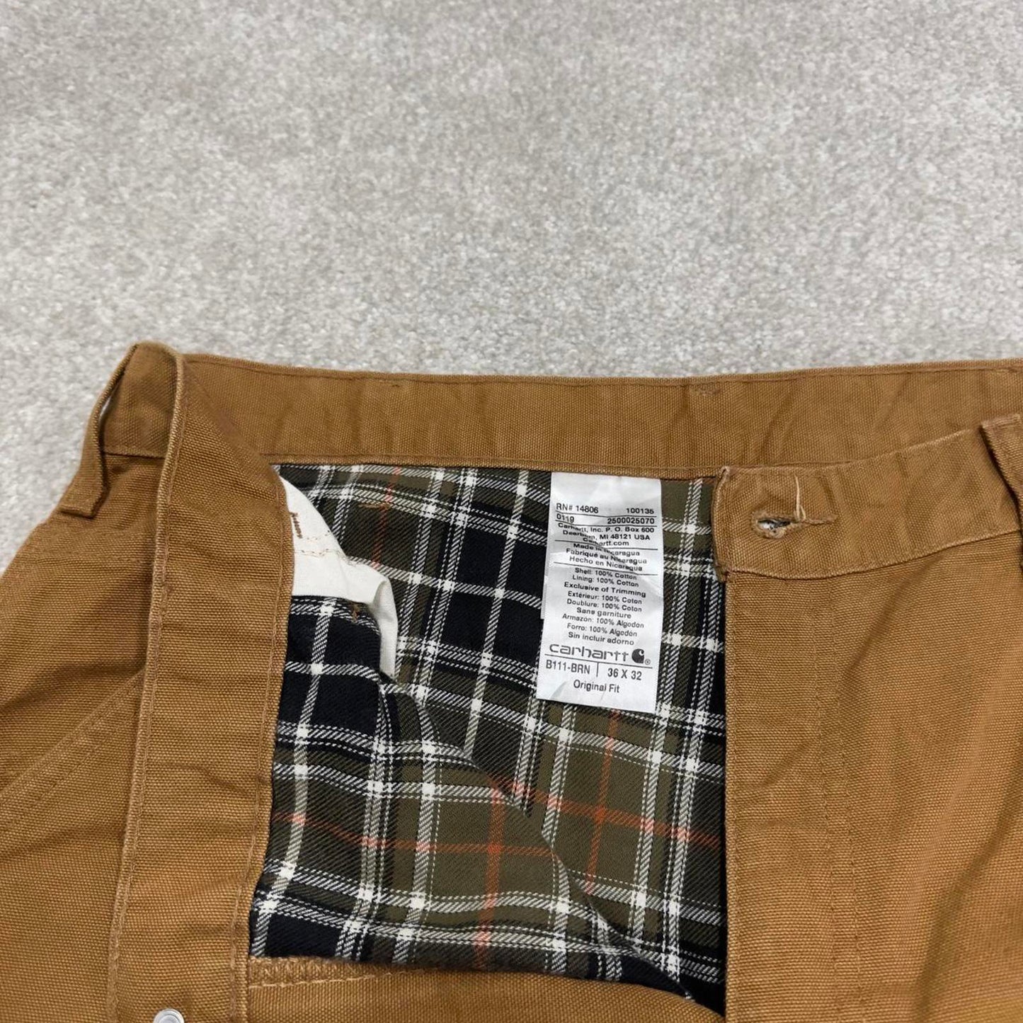 Vintage baggy Carhartt carpenter jeans tan 90s skater style W34L32 flannel lined carpenters