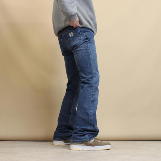Blue Carhartt jeans size 8 W30L34 original fit bootcut denim jeans patch logo