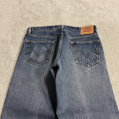 Y2K Levi’s 505 jeans blue starched denim W34L29 100% cotton straight fit 5 pocket belt loops red tab